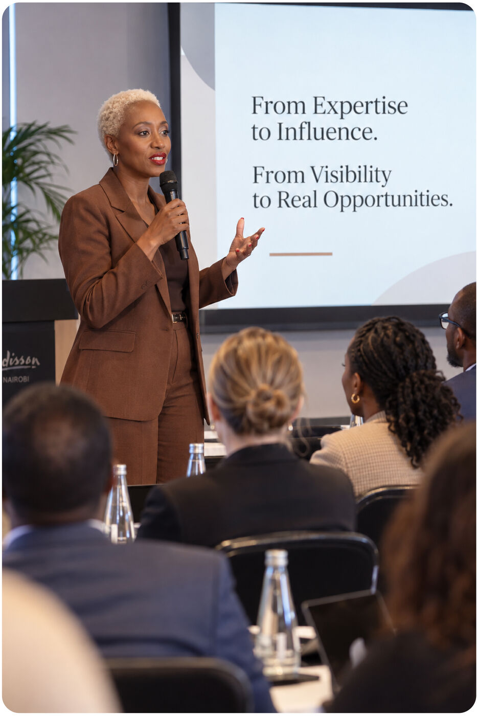 Ebi Sheila speaking at Radisson
